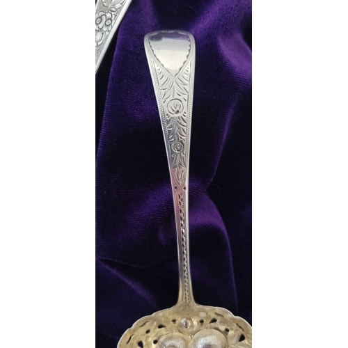 73 - TWO VERY FINE SILVER BERRY SPOONS, (i) AN EARLY 19TH CENTURY SILVER BERRY SPOON, with decorated stem... 