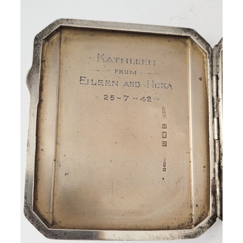 75 - THREE SILVER CIGARETTE CASES, (i) A neatly sized case decorated with engine cut design to the front,... 