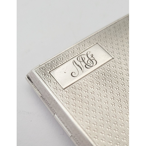 75 - THREE SILVER CIGARETTE CASES, (i) A neatly sized case decorated with engine cut design to the front,... 