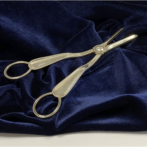 8 - A VICTORIAN SILVER GRAPE SCISSORS, Hallmarked J.G. likely for John Gilbert, Birmingham c.1866. With ... 