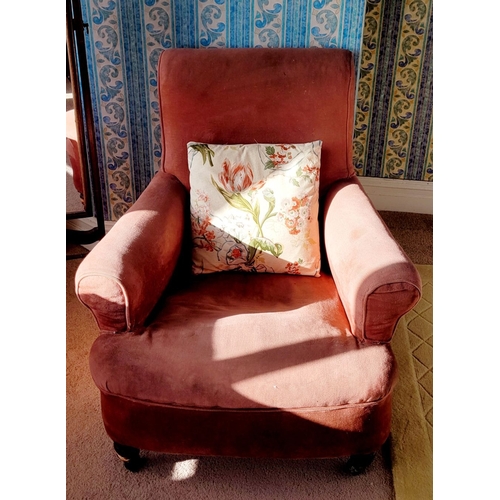 87 - A LOW RISE ANTIQUE DEEP-SEATED ARMCHAIR, with a sprung seat, raised on turned front leg and square b... 