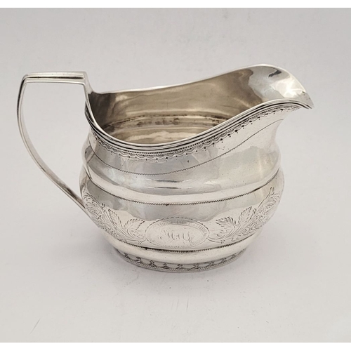 9 - A GOOD GEORGE III BRIGHT CUT CORK SILVER CREAM JUG, by S Greene Cork c.1800. With reeded border to t... 