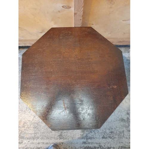 AN EDWARDIAN OCTAGONAL TILT TOP TABLE, octagonal top, raised on pod ...