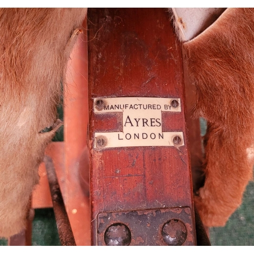 183 - A VINTAGE EARLY 20TH CENTURY AYRES HIDE COVERED ROCKING HORSE, the hide/hair covered horses rarer th... 