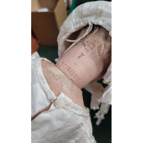 184 - A VINTAGE GERMAN MADE BISQUE COMPOSITE JOINTED DOLL; the delicately created facial features of this ... 