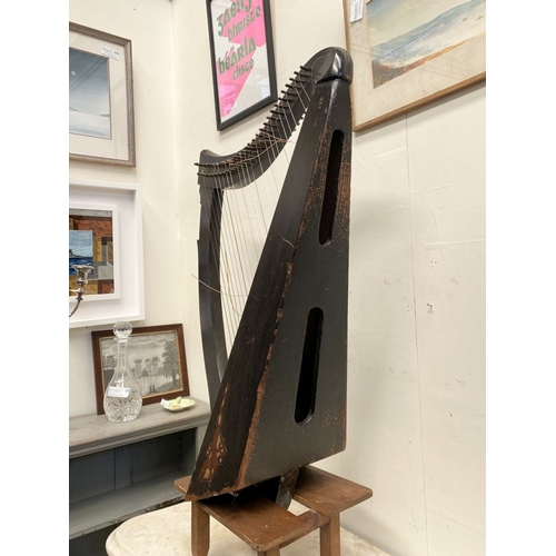 185 - A VINTAGE HARDWOOD IRISH HARP, 28 string harp. Complete with hardwood stand with brass capped feet. ... 