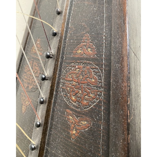 185 - A VINTAGE HARDWOOD IRISH HARP, 28 string harp. Complete with hardwood stand with brass capped feet. ... 