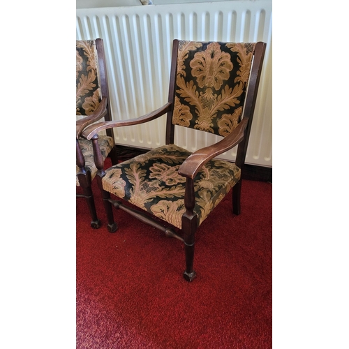 187 - A PAIR OF LOW RISE OR CHILDREN’S VINTAGE ARMCHAIRS, with upholstery to the back and seat. Raised on ... 