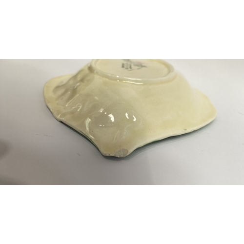 189 - A NEWPORT POTTERY CLARICE CLIFF DISH & SPOON, pink flower dish and spoon, the dish with Makers marks... 