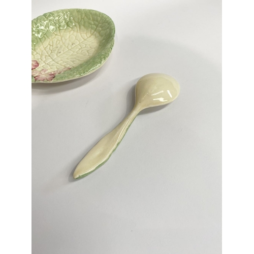 189 - A NEWPORT POTTERY CLARICE CLIFF DISH & SPOON, pink flower dish and spoon, the dish with Makers marks... 