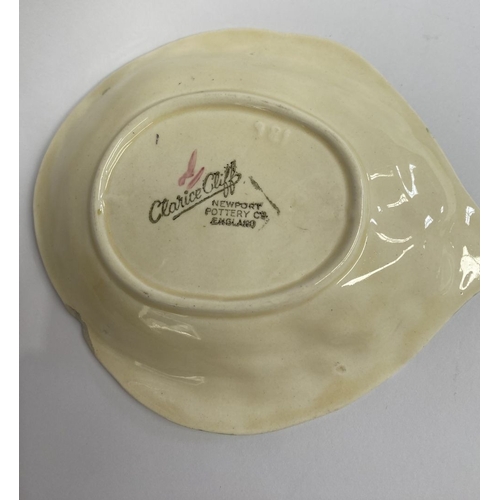 189 - A NEWPORT POTTERY CLARICE CLIFF DISH & SPOON, pink flower dish and spoon, the dish with Makers marks... 