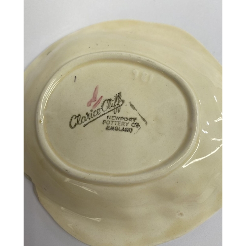 189 - A NEWPORT POTTERY CLARICE CLIFF DISH & SPOON, pink flower dish and spoon, the dish with Makers marks... 