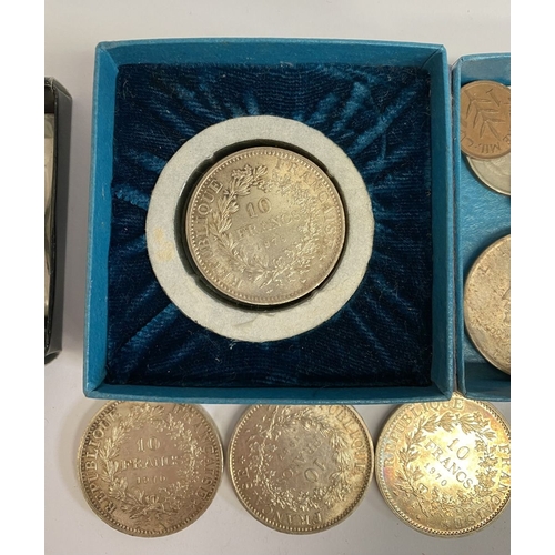 199 - A COLLECTION OF WORLDWIDE COINS, to include five 10 Francs coins dating 1967 – 1970, two United Stat... 