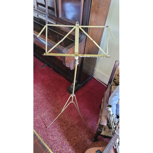 206 - A GENERATION BRITISH MADE ADJUSTABLE MUSIC STAND, with folding top, raised on a tripod style base. O... 