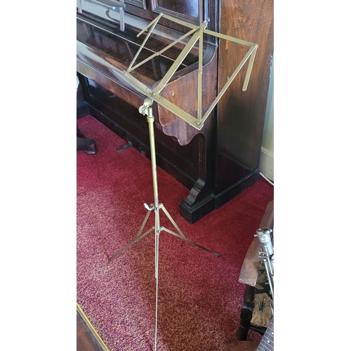 206 - A GENERATION BRITISH MADE ADJUSTABLE MUSIC STAND, with folding top, raised on a tripod style base. O... 