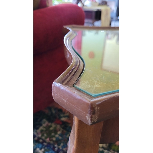 208 - A NEATLY SIZED SERPENTINE SHAPED GLASS TOP SIDE / LAMP TABLE, the table top with shaped glass surfac... 