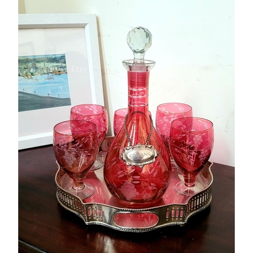 210 - A FANTASTIC VINTAGE CRANBERRY GLASS DRINKS SET, includes a baluster shaped decanter with stopper and... 