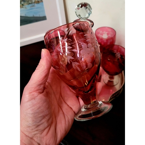 210 - A FANTASTIC VINTAGE CRANBERRY GLASS DRINKS SET, includes a baluster shaped decanter with stopper and... 