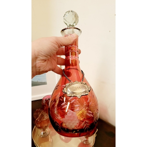210 - A FANTASTIC VINTAGE CRANBERRY GLASS DRINKS SET, includes a baluster shaped decanter with stopper and... 