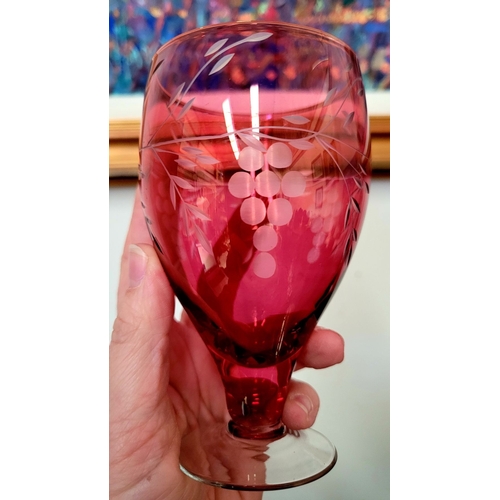 210 - A FANTASTIC VINTAGE CRANBERRY GLASS DRINKS SET, includes a baluster shaped decanter with stopper and... 