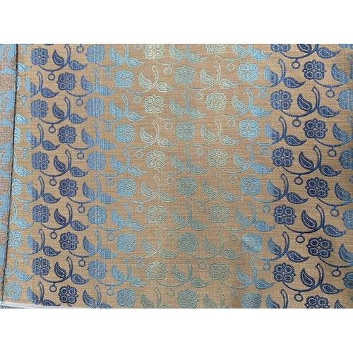 212 - A LARGE COLLECTION OF ROLLS OF FABRICS, by a variety of Makers and in a variety of patterns etc. As ... 