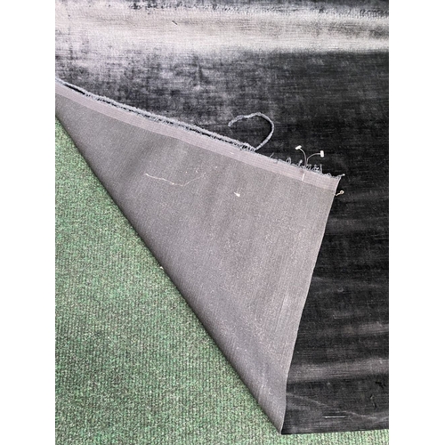 212 - A LARGE COLLECTION OF ROLLS OF FABRICS, by a variety of Makers and in a variety of patterns etc. As ... 