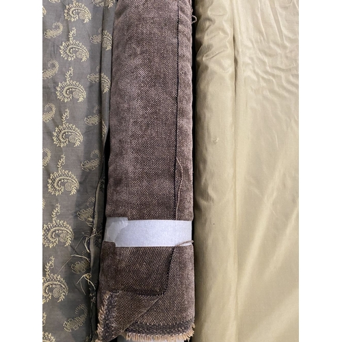 212 - A LARGE COLLECTION OF ROLLS OF FABRICS, by a variety of Makers and in a variety of patterns etc. As ... 