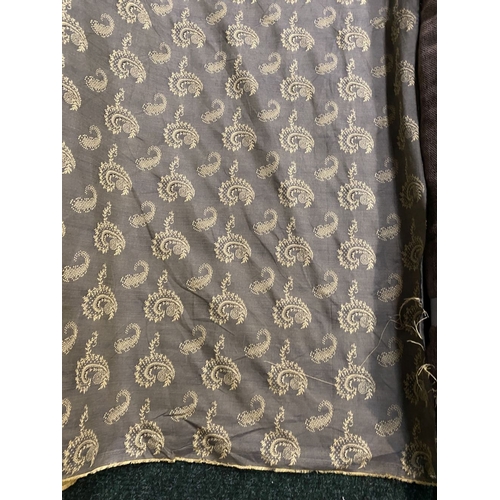 212 - A LARGE COLLECTION OF ROLLS OF FABRICS, by a variety of Makers and in a variety of patterns etc. As ... 