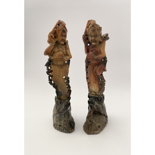 219 - FOUR PIECES OF CHINESE SOAPSTONE: A PAIR OF CHINESE SOAPSTONE CARVED FIGURES, on bases, nicely detai... 