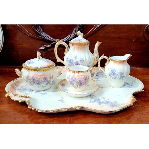 223 - A DELICATE VINTAGE FRENCH MADE R. DELIMIERES & CIE, LIMOGES – D&C TEA SET, which includes a large tr... 