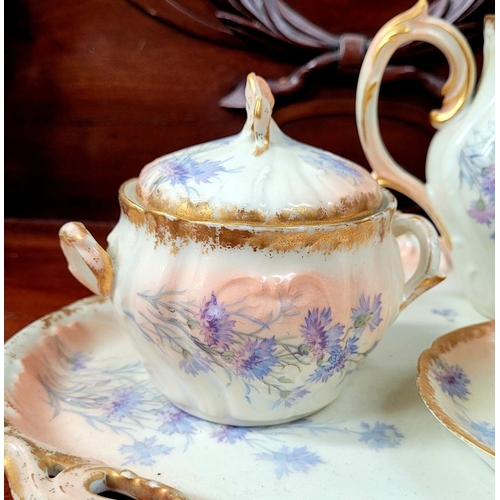 223 - A DELICATE VINTAGE FRENCH MADE R. DELIMIERES & CIE, LIMOGES – D&C TEA SET, which includes a large tr... 