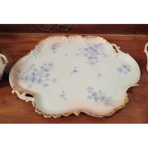 223 - A DELICATE VINTAGE FRENCH MADE R. DELIMIERES & CIE, LIMOGES – D&C TEA SET, which includes a large tr... 