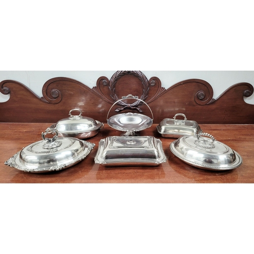 232 - A VERY GOOD COLLECTION OF SILVER PLATE SEVERING DISHES, includes an Egan of Cork dish & a Harrod’s o... 