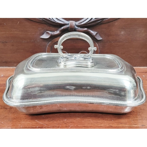 232 - A VERY GOOD COLLECTION OF SILVER PLATE SEVERING DISHES, includes an Egan of Cork dish & a Harrod’s o... 