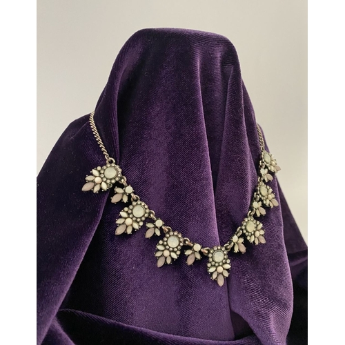 233 - A PRETTY SILVER TONE GEMSET NECKLACE & PAIR OF DROP EARRINGS, the necklace is set with a variety of ... 