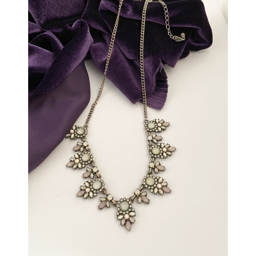 233 - A PRETTY SILVER TONE GEMSET NECKLACE & PAIR OF DROP EARRINGS, the necklace is set with a variety of ... 