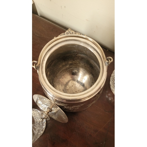 235 - A WATERFORD CRYSTAL DECANTER, along with a pair of glasses and a lovely silver plate ice container –... 