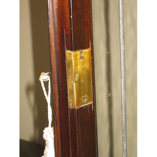 243 - A MAHOGANY INLAID SERPENTINE GLAZED DISPLAY CABINET, the raised gallery to back with inlaid detail, ... 