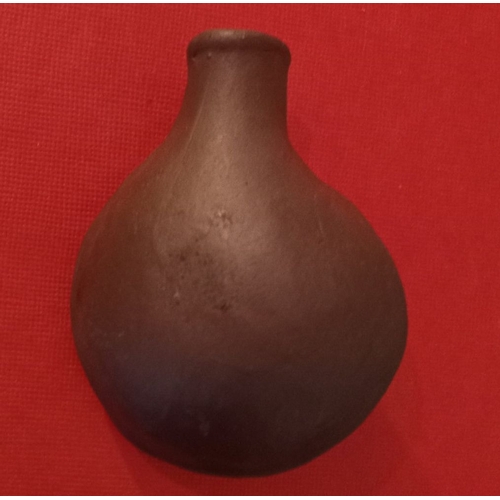 184 - A 19TH CENTURY TERRACOTTA SNUFF BOTTLE, c.1880, traditional form with carved male bust in relief to ... 