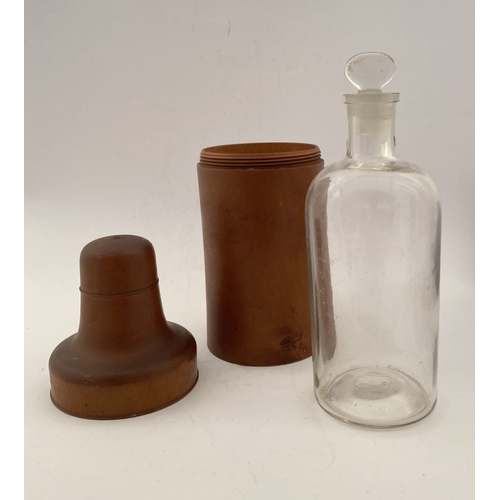 185 - AN ANTIQUE BOXWOOD CASED APOTHECARY/PERFUME BOTTLE, glass bottle with stopper numbered to base. The ... 