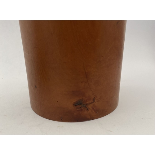 185 - AN ANTIQUE BOXWOOD CASED APOTHECARY/PERFUME BOTTLE, glass bottle with stopper numbered to base. The ... 