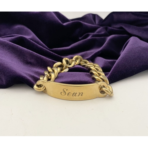 189 - A GOLD-TONE ENGRAVED MEN'S ID BRACELET, engraved ‘Sean’ to front, ‘2 Deacon Close St. Albans’ to rev... 