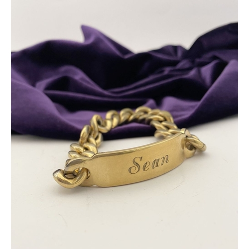 189 - A GOLD-TONE ENGRAVED MEN'S ID BRACELET, engraved ‘Sean’ to front, ‘2 Deacon Close St. Albans’ to rev... 