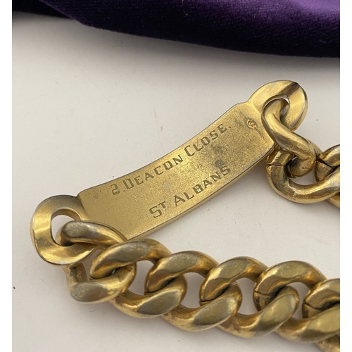 189 - A GOLD-TONE ENGRAVED MEN'S ID BRACELET, engraved ‘Sean’ to front, ‘2 Deacon Close St. Albans’ to rev... 
