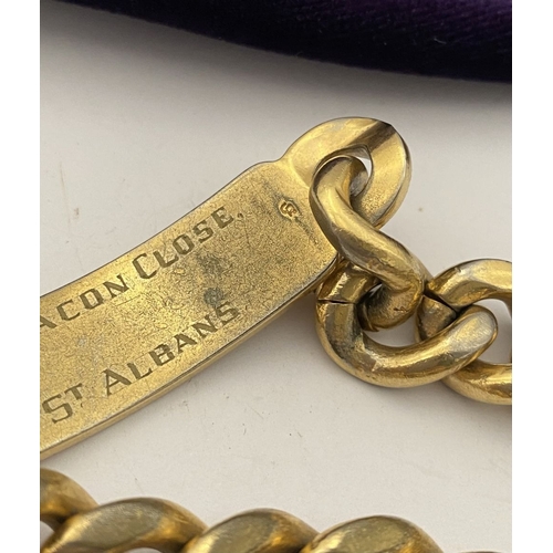 189 - A GOLD-TONE ENGRAVED MEN'S ID BRACELET, engraved ‘Sean’ to front, ‘2 Deacon Close St. Albans’ to rev... 