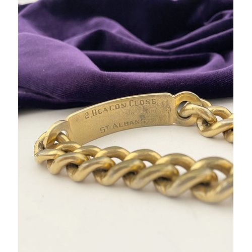 189 - A GOLD-TONE ENGRAVED MEN'S ID BRACELET, engraved ‘Sean’ to front, ‘2 Deacon Close St. Albans’ to rev... 