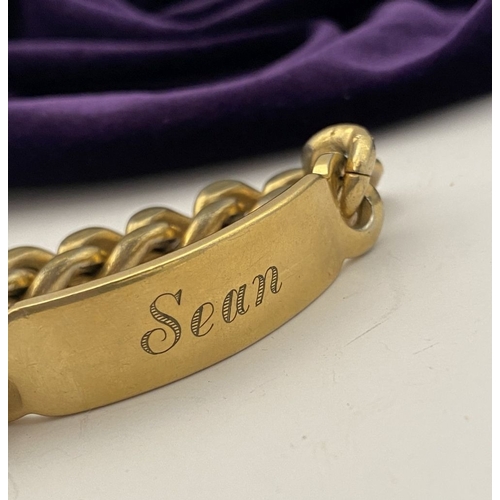 189 - A GOLD-TONE ENGRAVED MEN'S ID BRACELET, engraved ‘Sean’ to front, ‘2 Deacon Close St. Albans’ to rev... 
