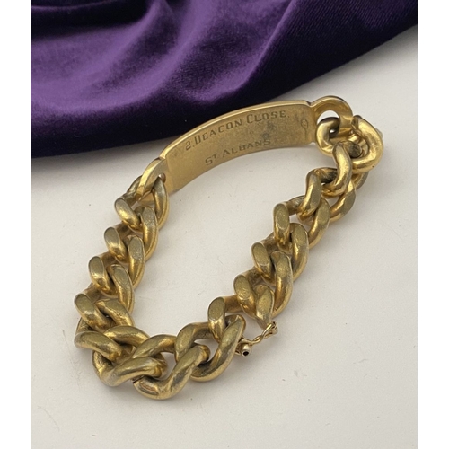 189 - A GOLD-TONE ENGRAVED MEN'S ID BRACELET, engraved ‘Sean’ to front, ‘2 Deacon Close St. Albans’ to rev... 
