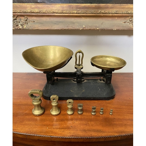196 - A VINTAGE BRITISH ‘THE VIKING’ WEIGHING SCALES WITH BRASS WEIGHTS, dimensions: scales: 37cm wide app... 