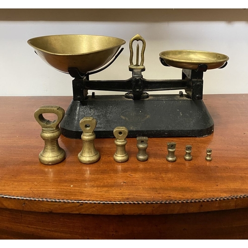 196 - A VINTAGE BRITISH ‘THE VIKING’ WEIGHING SCALES WITH BRASS WEIGHTS, dimensions: scales: 37cm wide app... 